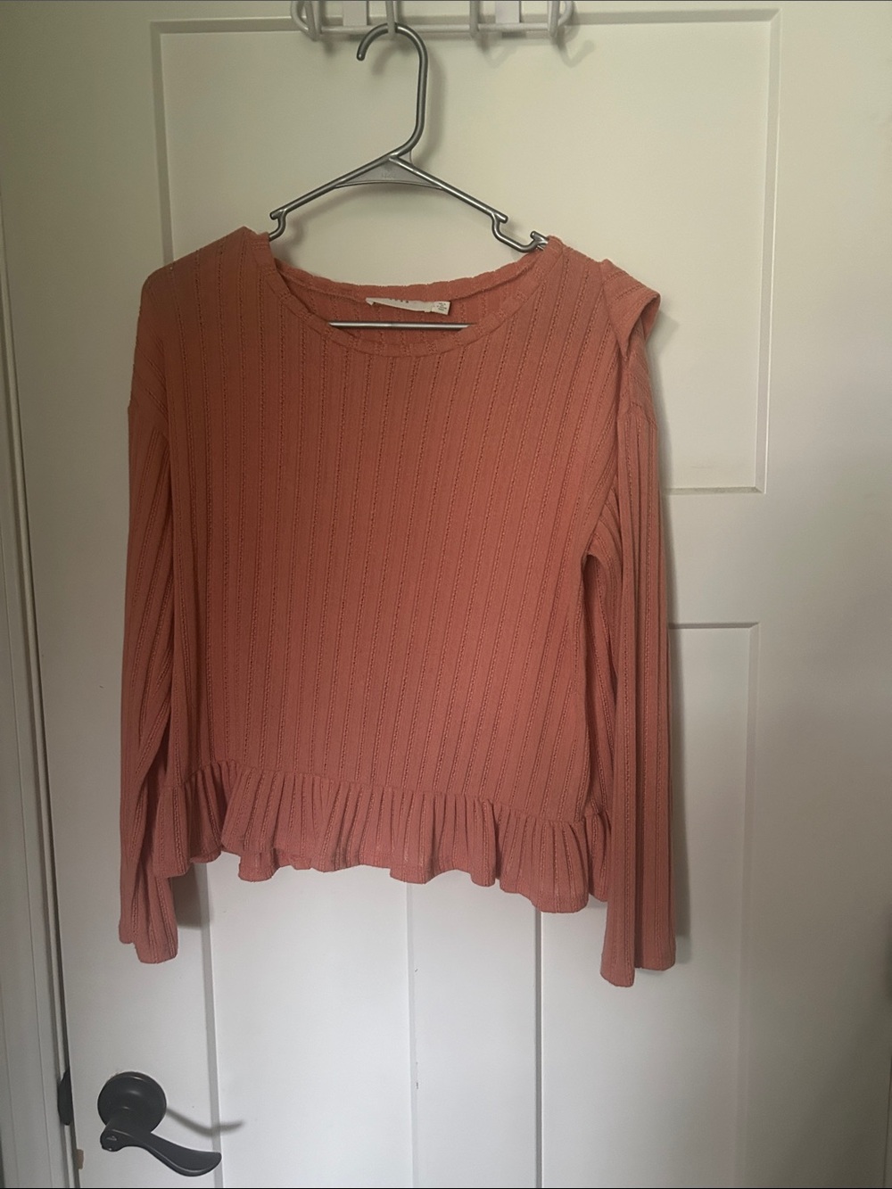 Lush Coral Ruffle-Hem Long Sleeve Top